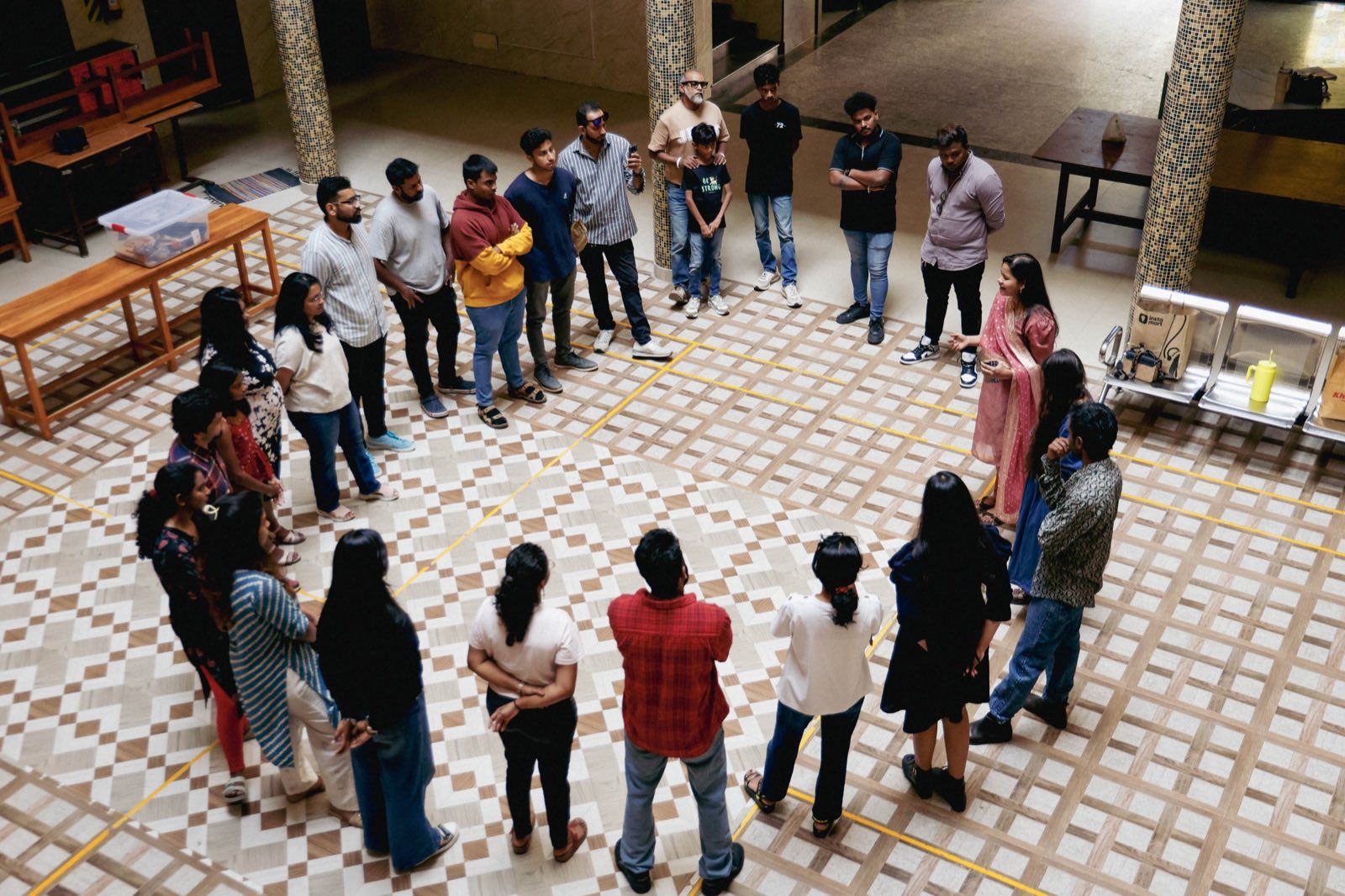 A Circle group gathered together in conversation