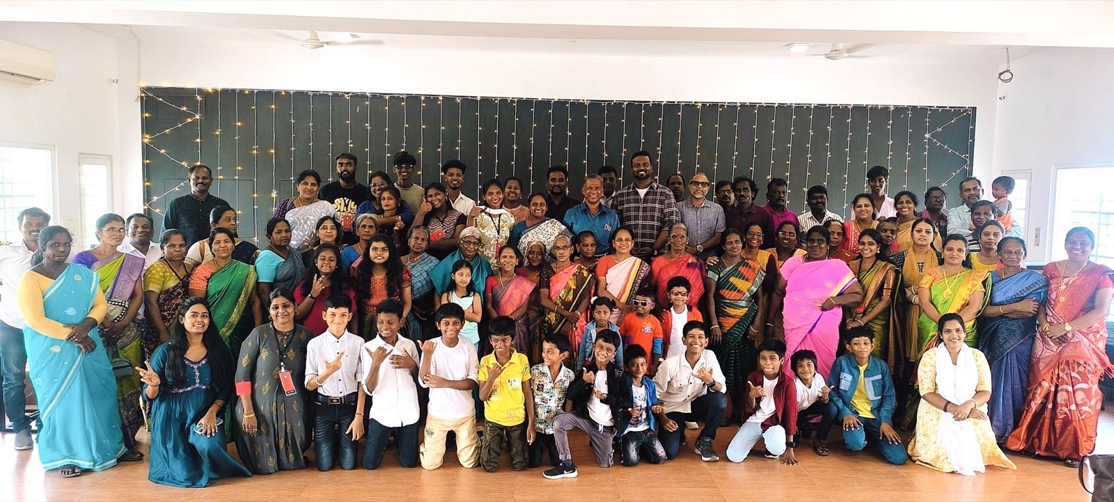 Freedom Tamil congregation gathered together for a group photo